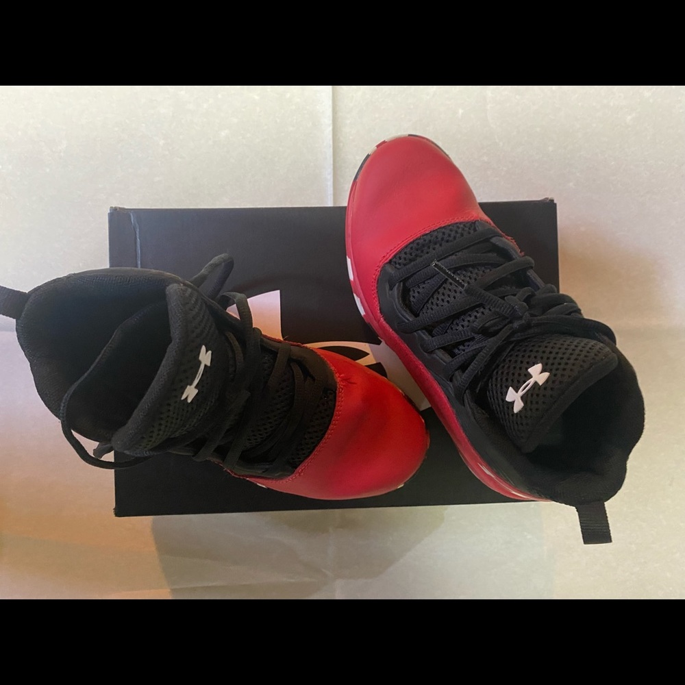 Boys UA basketball shoes